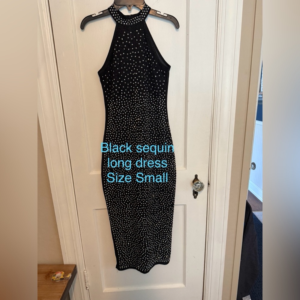 Black sequined long dress.
